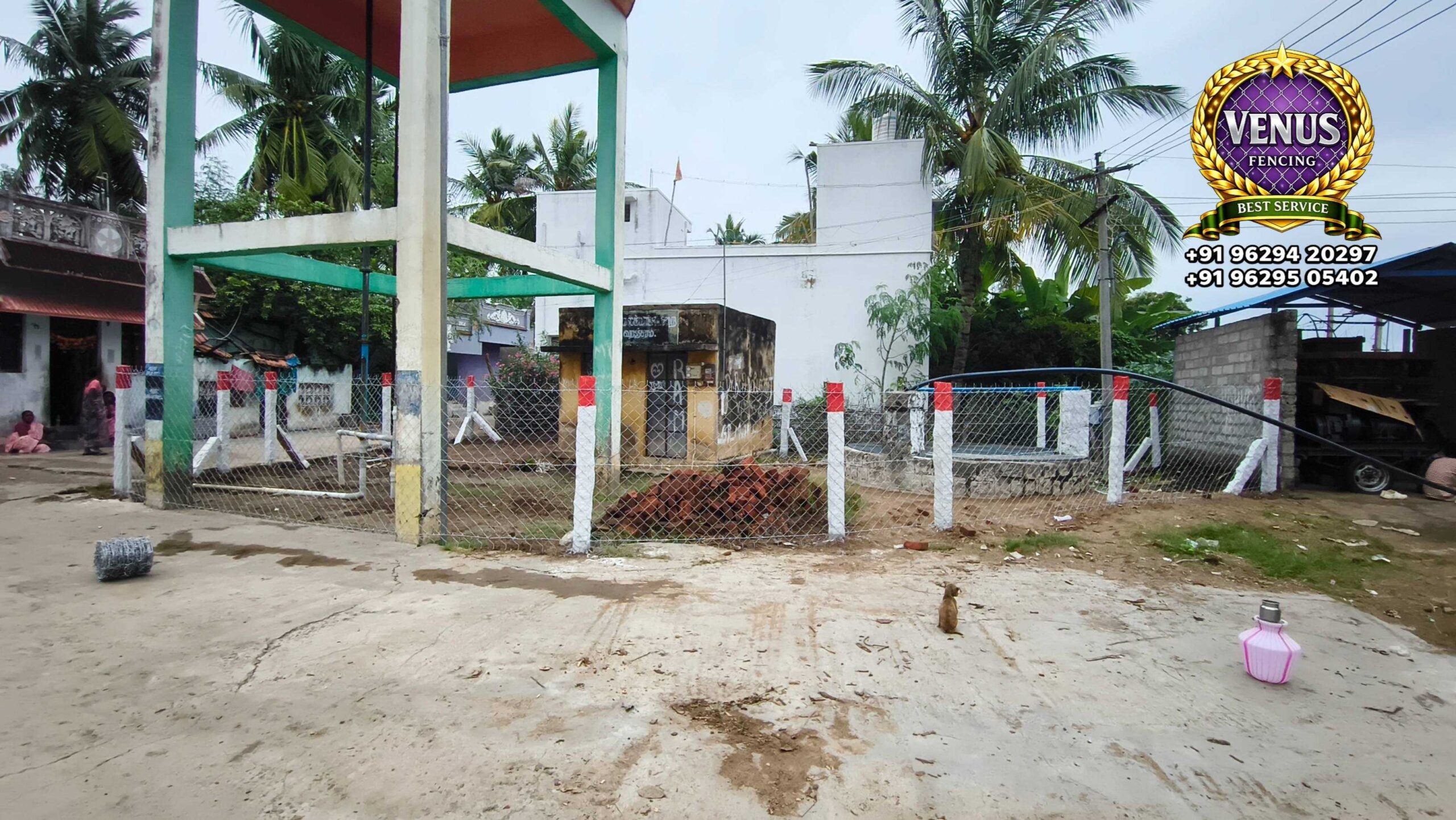 Chain Link Fencing with barbed wire lines